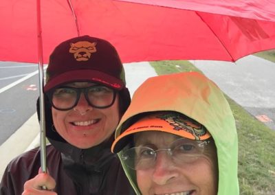 UMFL Volunteering in Rain with Stacy